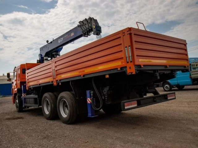 Фото №2: Бортовой КАМАЗ 65115 с КМУ DongYang SS1956