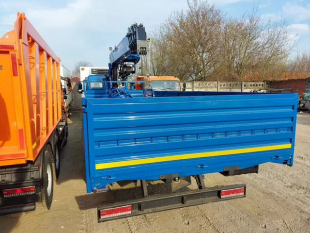 Фото №9: Бортовой КАМАЗ 65115 с КМУ DongYang SS1956