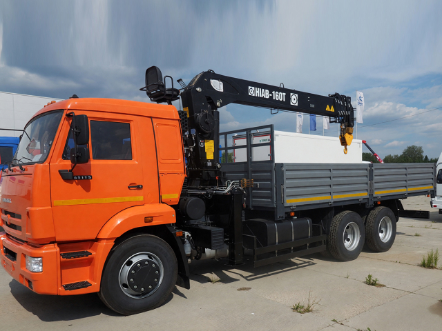 Фото №1: Бортовой КАМАЗ 65115 с КМУ HIAB-160T